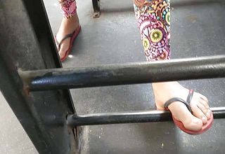 Teen girl feet on public bus